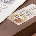 Detail of twisted rope ring band with pink diamond-shaped stone and two white pearls - Adjustable Open / Pink Rhombus Stone Pearl Style (JZ4353)