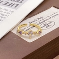 Detail of vintage enamel ring with pear-cut zircon and purple accents on card - Adjustable Open / Teardrop White Zircon Style (JZ5448)