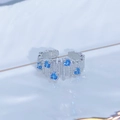 Macro view of silver adjustable wide ring with sparkling blue zircon inlays - Adjustable Open / Vertical Texture Wide Band Blue Gem Style (JZ6268)