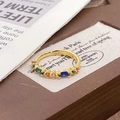 Macro shot of retro gold ring with colorful zircon inlays and adjustable open band - Adjustable Open / Multicolor Inlaid Gemstone Style (JZ5451)