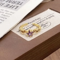 Macro shot of 18K gold open ring with purple star zircon and moon relief details - Adjustable Open / Purple Star Gemstone Style (JZ5770)