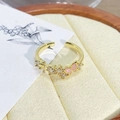 Macro shot of vintage style gold ring with pink enamel butterfly and cubic zirconia stones - Adjustable Open / Pink Enamel Butterfly with Three Diamonds Style (JZ0218A)