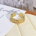 Detail of vintage style golden open ring with pink zircons on a jewelry tray - Adjustable Open / Vintage Elegant Ripple Pink Zircon Style (JZ0288A)