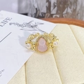Macro detail of vintage floral ring with pink gourd stone and pearl accents - Adjustable Open / Pink Gourd Pearl Twist Pattern Style (JZ0297A)