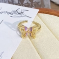 Detailed close-up of purple enamel butterfly ring with gold-plated twisted rope band - Adjustable Open / Purple Enamel Butterfly Twist Rope Style (JZ0453A)