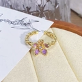 Close-up of vintage flower ring with violet enamel petals and twisted golden band - Adjustable Open / Purple Petal Twist Band Style (JZ0456A)