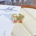 Macro detail of a vintage enamel butterfly ring with gold plating and adjustable band - Adjustable Open / Pink and Green Gradient Butterfly Oil Drop Style (JZ0679A)