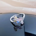 Macro shot of silver butterfly ring with colorful pear-cut gemstones and clear zircon - Butterfly Shape Style (JZ0906A)