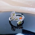 Macro shot of colorful zircon fishtail open ring on black reflective surface - Fishtail Shape Style (JZ3363A)