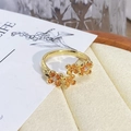 Detailed macro view of vintage gold flower ring with enamel and sparkling zircon accents - Adjustable Open / Vintage Pastoral Four Flowers Style (JZ1178A)