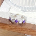 Macro shot of silver geometric ring featuring purple stones and sparkling zircon details - Geometric Rhombus Design (JZ3574A)