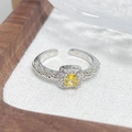 Detailed macro view of an adjustable silver ring with yellow square zircon and crystals - Square Yellow Main Stone Woven Texture Style (JZ2215A)