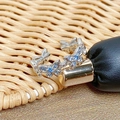 Close-up of butterfly open ring featuring light blue and clear cubic zirconia stones - Light Blue Zircon Agile Butterfly Style (JZ4577)