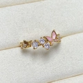 Macro shot of gold butterfly ring featuring pink enamel work and white zircon inlay - Adjustable Open / Gold Pink Enamel Butterfly Style (JZ0218A)