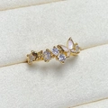 Macro detail of a golden butterfly ring featuring pink enamel wings and zircon accents - Adjustable Open / Gold Pink Shell Texture Butterfly Style (JZ0225A)