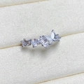 Macro shot of silver butterfly ring with shimmering zircon clusters and shell wings - Adjustable Open / Silver Butterfly Flower Cluster Zirconia Style (JZ0227A)