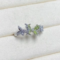 Detailed close-up of butterfly ring with light green crystals and micro-pave stones - Adjustable Open / Green Triple Butterfly Spliced Style (JZ1940A)