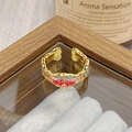 Macro shot of a vintage gold-plated enamel flower ring with inlaid white zircon - Adjustable Open / Red Blue Green Enamel Zircon Style (JZ0920A)