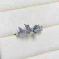 Detail of silver butterfly ring with olive green gems and sparkling zircon stones - Adjustable Open / Olive Green Marquise Stone Double Butterfly Style (JZ2197A)