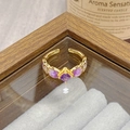 Macro detail of vintage gold floral ring featuring a square purple gemstone setting - Adjustable Open / Purple Square Zircon Vintage Style (JZ1996A)