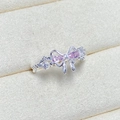 Macro detail of silver butterfly ring featuring pink zircon stones and twisted band - Adjustable Open / Pink Teardrop Stone Twisted Rope Bow Style (JZ2203A)