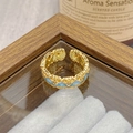 Macro view of vintage gold ring with blue enamel inlay and scalloped floral edge - Adjustable Open / Light Blue Vintage Carved Style (JZ5427)