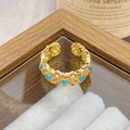 Close-up of vintage gold hollow ring with blue bead and colorful enamel details - Adjustable Open / Sky Blue Bead Pink Purple Palace Style (JZ5903)