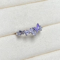 Macro shot of silver butterfly ring featuring purple enamel wings and cubic zirconia gems - Adjustable Open / Silver Lavender Gradient Enamel Butterfly Style (JZ6212)