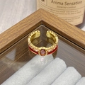 Detail view of vintage enamel flower ring with pink gemstone and gold finish - Adjustable Open / Oval Purple Gem Red Enamel Style (JZ6008)