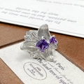 Macro detail of silver flower ring with square purple zircon and shimmering white diamonds - Adjustable Open / Floral Textured Purple Stone Style (JZ2213)