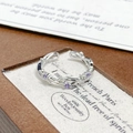 Macro shot of silver thorn ring featuring a purple zircon stone in a vintage jewelry box - Adjustable Open / Thorn Vine Purple Zircon Style (JZ3121A)