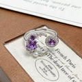 Macro detail of crescent moon ring with purple zircon star and a white pearl accent - Adjustable Open / Crescent Star Purple Crystal Style (JZ3976)