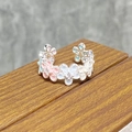 Detailed close-up of pastel enamel flower ring with sparkling zircon centers - Multicolor Mixed Flower Style (JZ2171A)