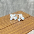 Detailed macro view of 925 silver open ring featuring blue enamel flowers and tiny zircons - Blue Double Flower Gradient Style (JZ2313A)