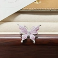 Macro view of purple enamel butterfly ring with oval clear stone and zircon accents - Lavender Glitter Butterfly Style (JZ2339A)