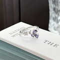 Detail of adjustable silver ring featuring purple pear-cut stones and clear crystals - Adjustable Open / Pear-shaped Purple Stone Butterfly Floral Style (JZ2939A)