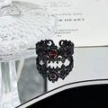 Gothic black carved ring with a vibrant red heart-shaped gemstone and intricate hollow patterns - Red Heart Hollow Carving Style (JZ4132)