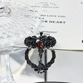 Detail of gothic rose relief ring featuring a red heart gem and black metal cross - Rose Wreath Red Heart Style (JZ4133)