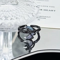 Macro view of dark punk crescent moon ring featuring a textured black vine band - Crescent Moon Vine Style (JZ4183)