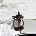Macro detail view of a dark gothic punk red star ring with dripping enamel texture - Dark Red Cross Dark Style (JZ5387)