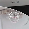 Detail of silver bow ring featuring pink marquise stone and twisted band design - Pink Marquise Zircon Bowknot Style (JZ2203A)