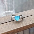 Detailed macro view of heart-shaped blue zircon on adjustable silver textured band - Heart Striped Design Style (JZ5580)