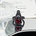 Detail of gothic ring featuring dark metal scales and a large faceted red gemstone - Dragon Scale Dark Red Stone Style (JZ2429)