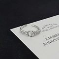 Detail view of moonstone and zircon inlaid silver ring on white display card - Seven Diamond Inlaid Style (JZ5335A)