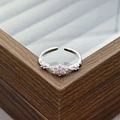 Detail of silver adjustable ring with pink zircon flower and twisted band design - Twisted Rope Pink Six-Petal Flower Style (JZ1424A)