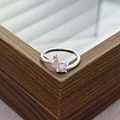 Detail view of silver butterfly ring featuring pink marquise stones and small white diamonds - Marquise Butterfly Pink Gem Style (JZ1874A)