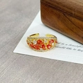 Detail of vintage gold open ring featuring orange red and white zircon floral stones - Arc Array Orange Red White Zirconia(JZ5444)