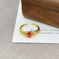 Detail of vintage gold open ring with orange pear-cut zircon and floral engraving - Orange Red Pear Retro Hollow(JZ6278)