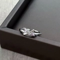 Macro detail of silver bow ring with pink marquise zircon on a jewelry box edge - Adjustable Open / Pink Marquise Zircon Bowknot (JZ3204A)