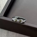 Detail of silver open ring with heart green gemstones and white zircon accents - Adjustable Open